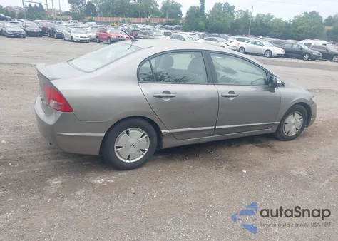 2006 Honda Civic Hybrid from USA, damaged, VIN JHMFA36216S014499